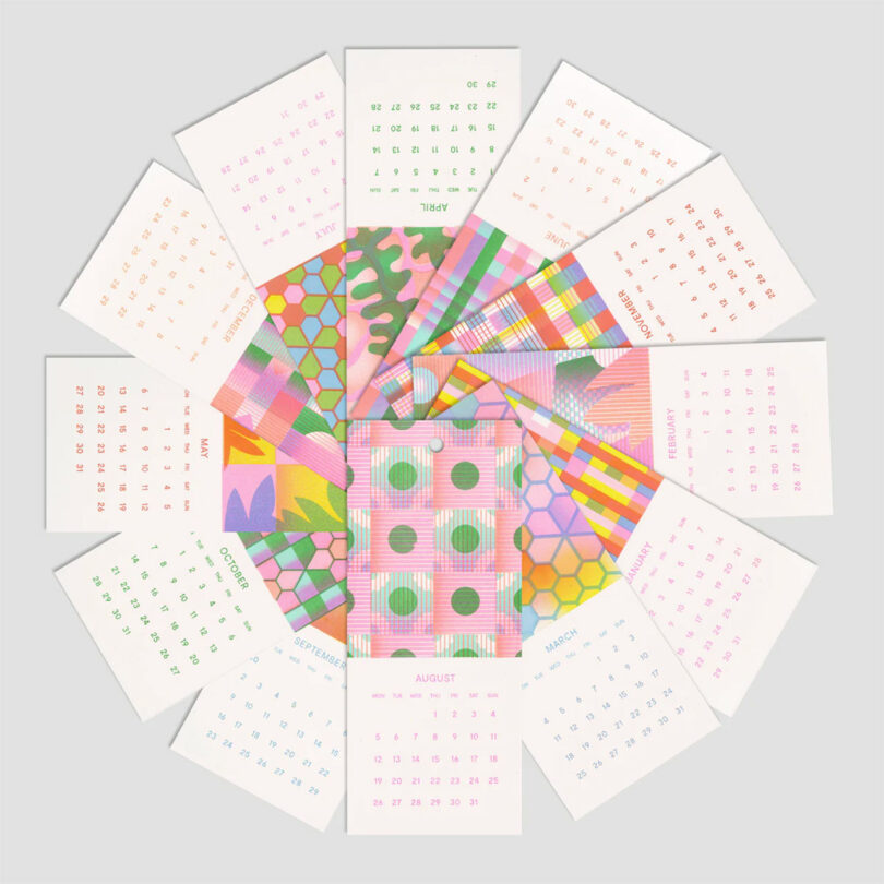 circular stacked calendar pages with colorful monthly designs
