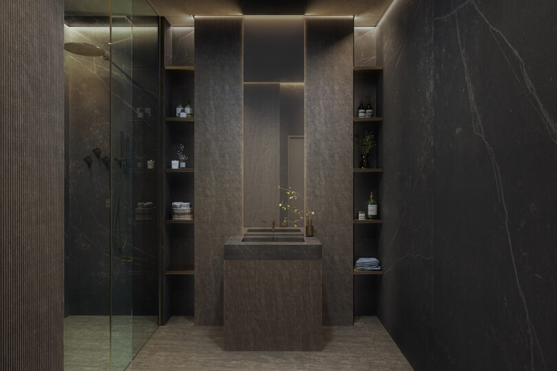 dark brown/grey bathroom with single sink and walk-in glass shower
