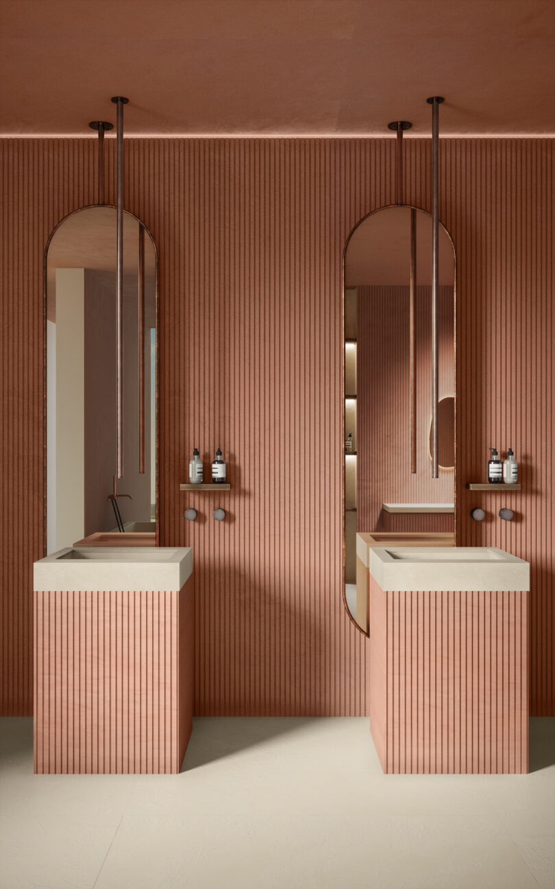 terracotta colored bathroom with double vanities