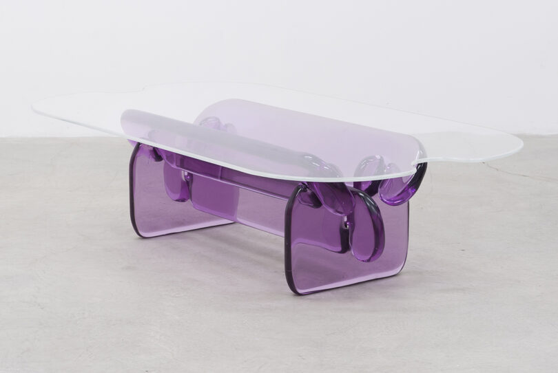 purple resin coffee table on a beige background