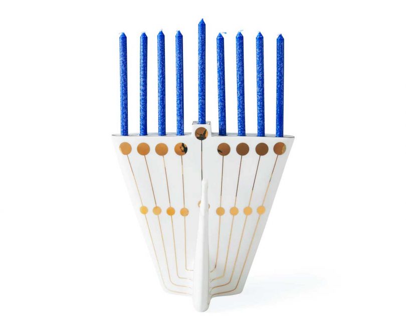white and gold peacock menorah with blue candles