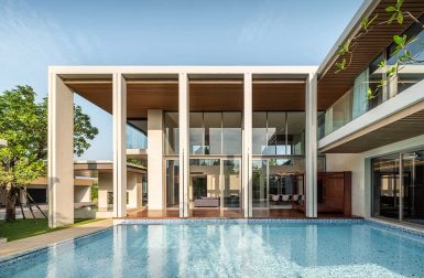 A Modern Bangkok House With a Central, Glass-Fronted Swimming Pool