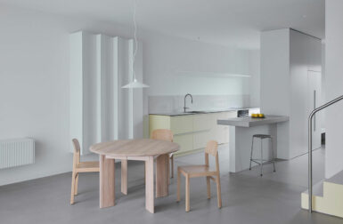 A Minimalist Lithuanian Townhouse With Subtle Pops of Pale Yellow