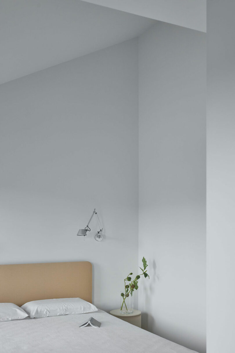 partial angled view of modern minimalist bedroom